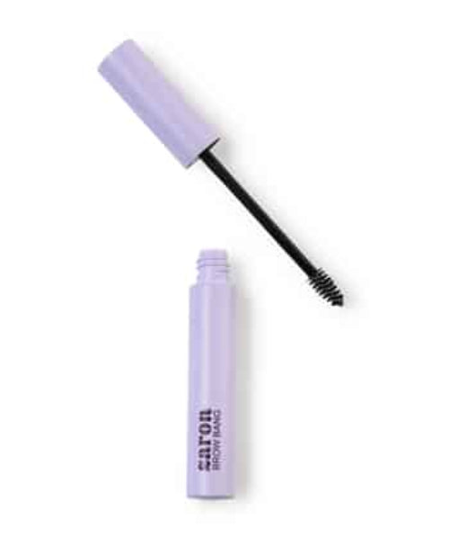 Mascara with purple casing and black wand on a white background