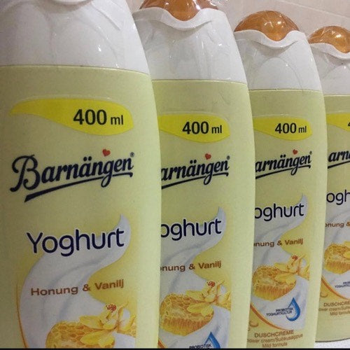 Barnängen Yoghurt bottles with honey and vanilla flavor on a white background