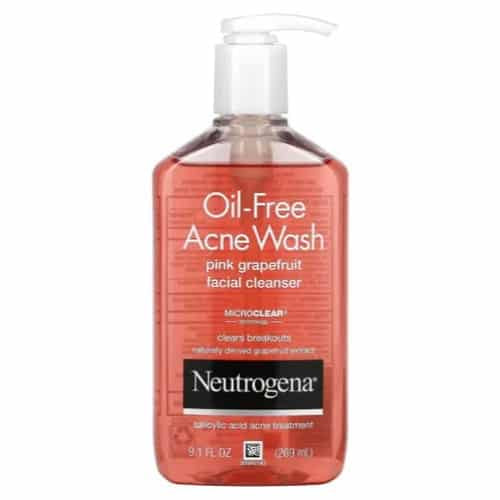 Neutrogena Oil-Free Acne Wash pink grapefruit facial cleanser bottle on a white background